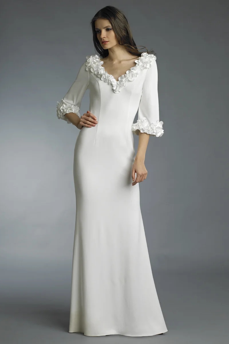 v neck gown with laser cut floral motif on sleeve and neckline